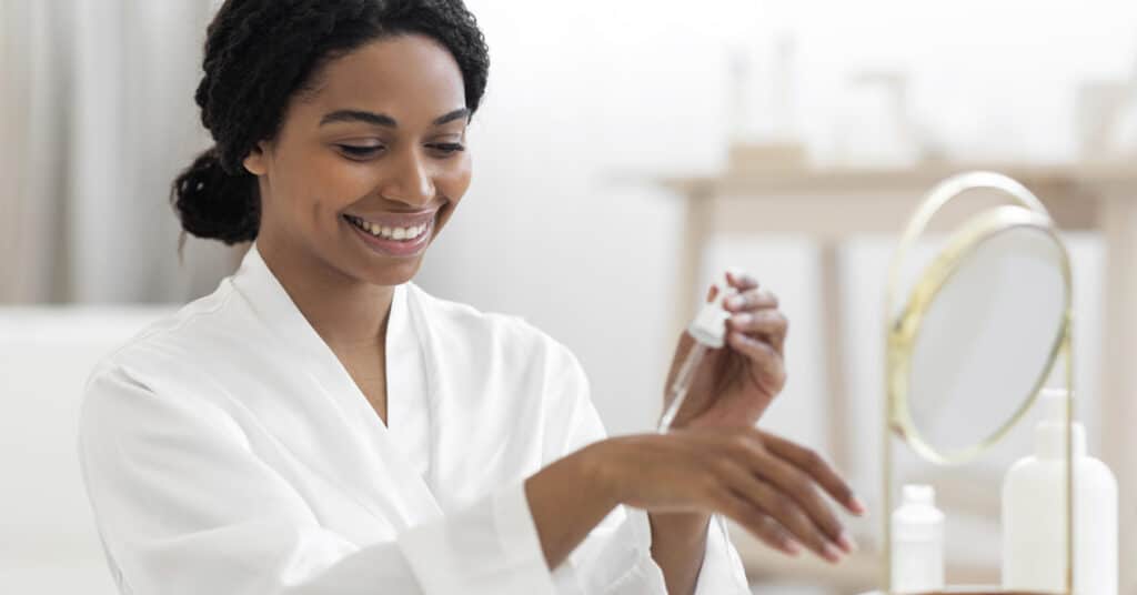 woman applying cosmeceutical products
