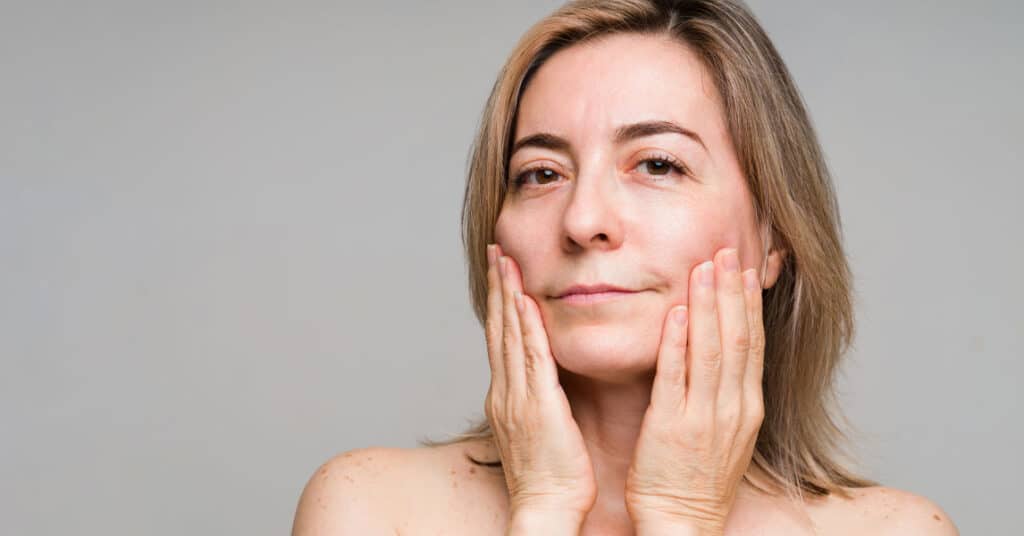 Woman sticking to a retinol routine